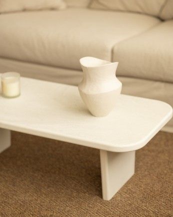 Haruto - Mesa de centro de microcemento con dos patas tono blanco roto de 95cm