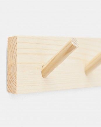 Kerry - Colgador de pared de madera maciza en tono natural de 61x5cm