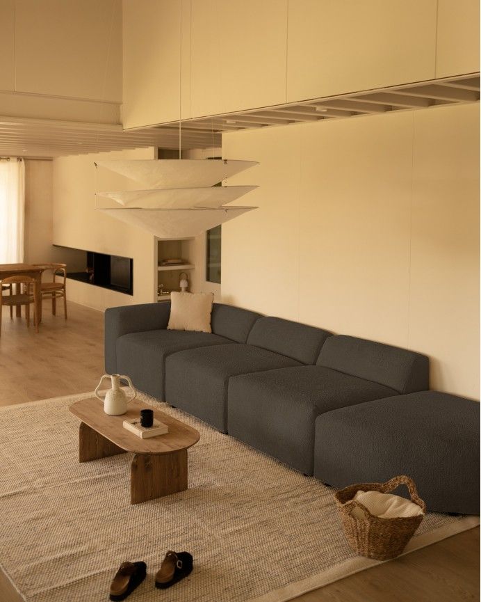 Bruce - Sofá de 4 módulos con curva de bouclé color gris oscuro 410x110cm
