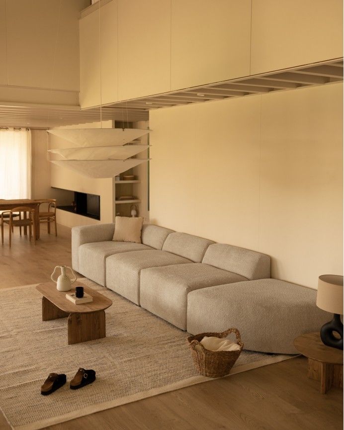 Bruce - Sofá de 4 módulos con curva de bouclé color gris claro 410x110cm