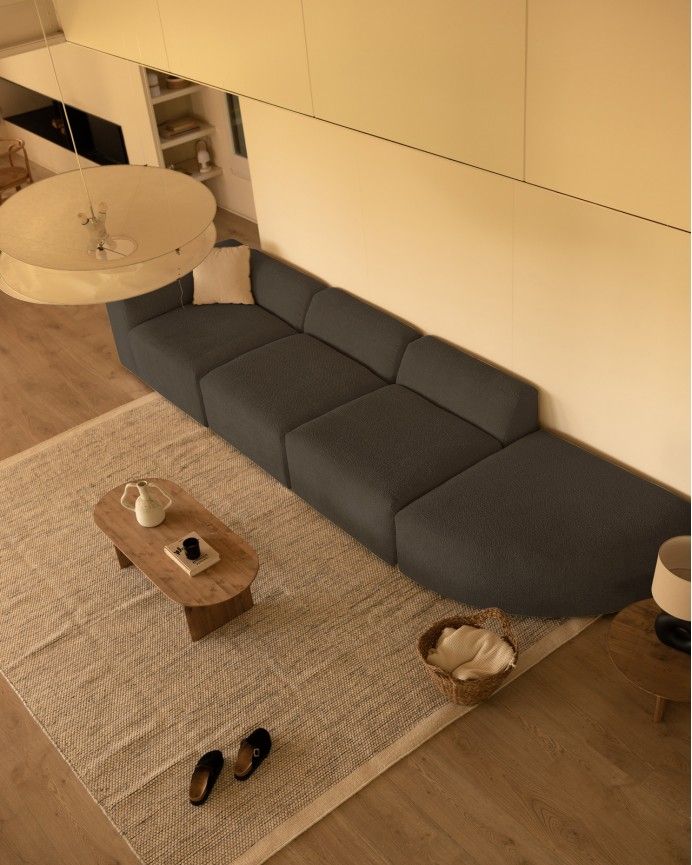 Bruce - Sofá de 4 módulos con curva de bouclé color gris oscuro 410x110cm