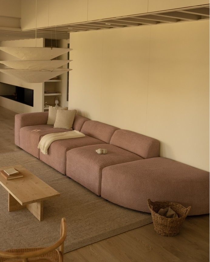 Bruce - Sofá de 4 módulos con curva de bouclé color rosa 410x110cm