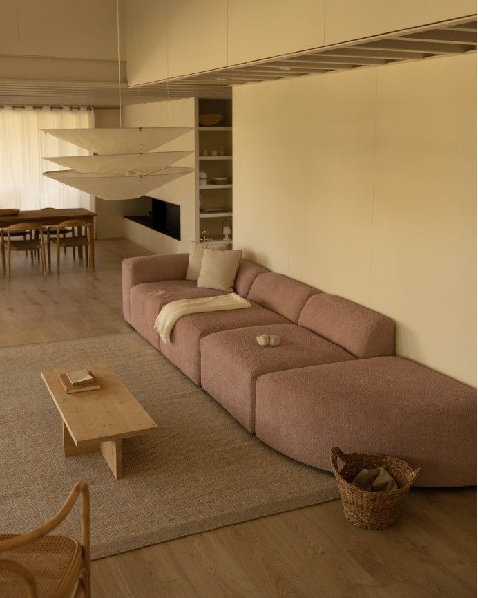 Bruce - Sofá de 4 módulos con curva de bouclé color rosa 410x110cm