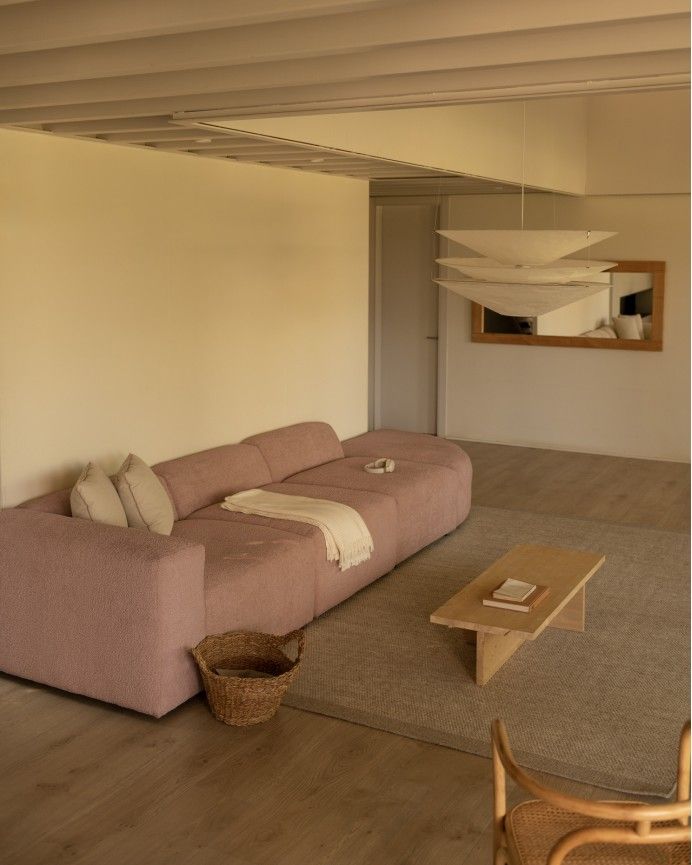 Bruce - Sofá de 4 módulos con curva de bouclé color rosa 410x110cm