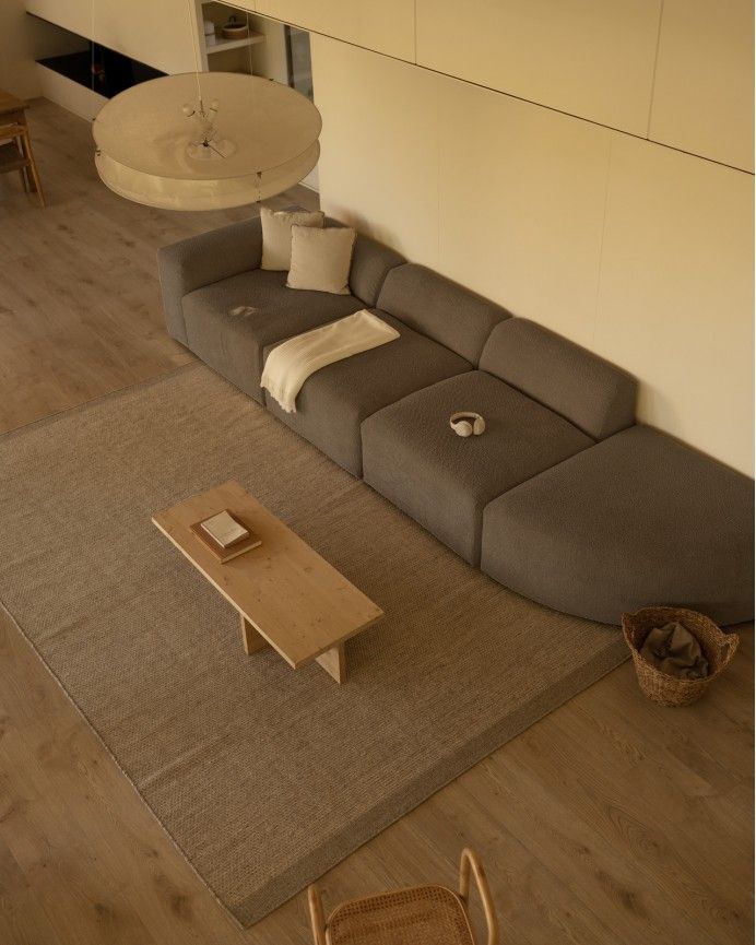 Bruce - Sofá de 4 módulos con curva de bouclé color marrón 410x110cm