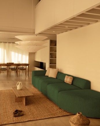 Bruce - Sofá de 4 módulos con curva de bouclé color verde 410x110cm