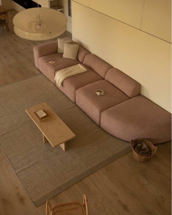 Bruce - Sofá de 4 módulos con curva de bouclé color rosa 410x110cm
