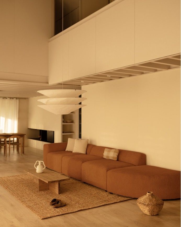 Bruce - Sofá de 4 módulos con curva de bouclé color cobre 410x110cm