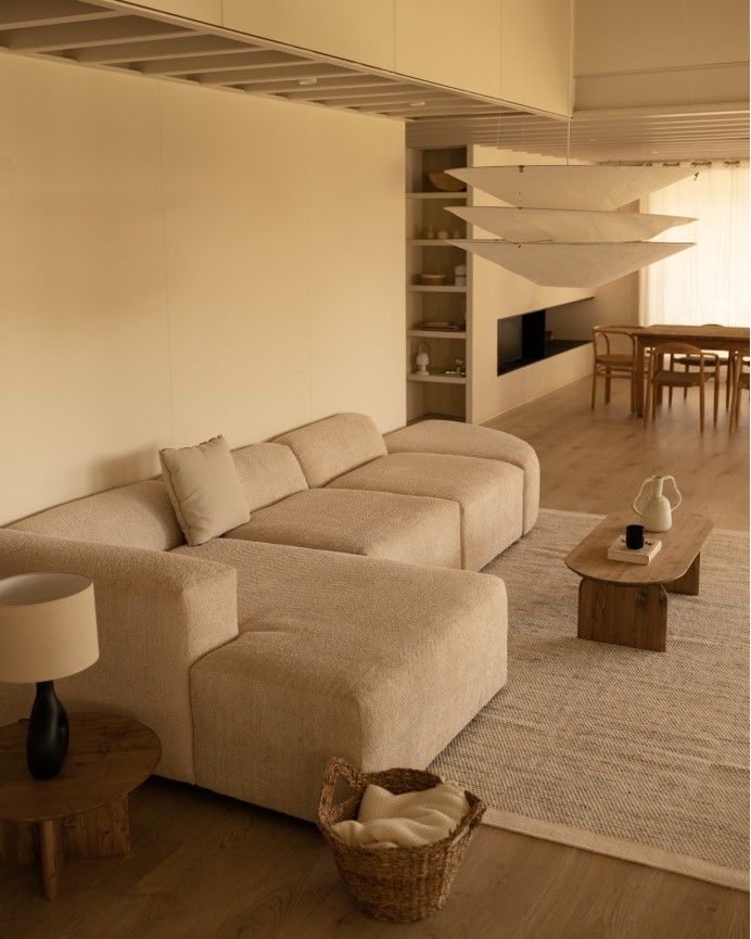 Bruce - Sofá de 4 módulos curvo con chaise longue izquierdo de bouclé color beige 410x172cm