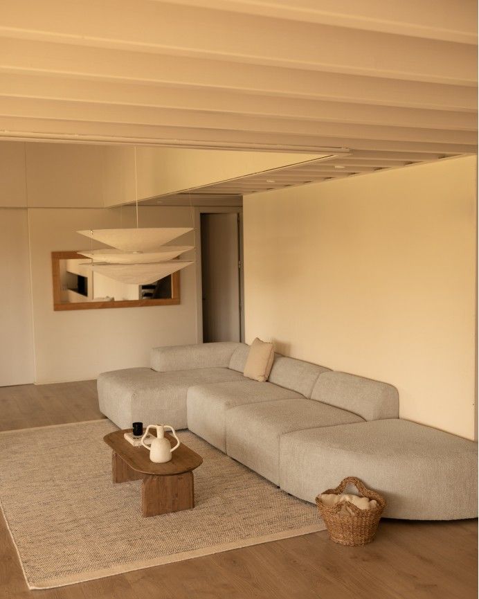 Bruce - Sofá de 4 módulos curvo con chaise longue izquierdo de bouclé color gris claro 410x172cm