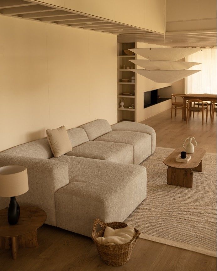 Bruce - Sofá de 4 módulos curvo con chaise longue izquierdo de bouclé color gris claro 410x172cm