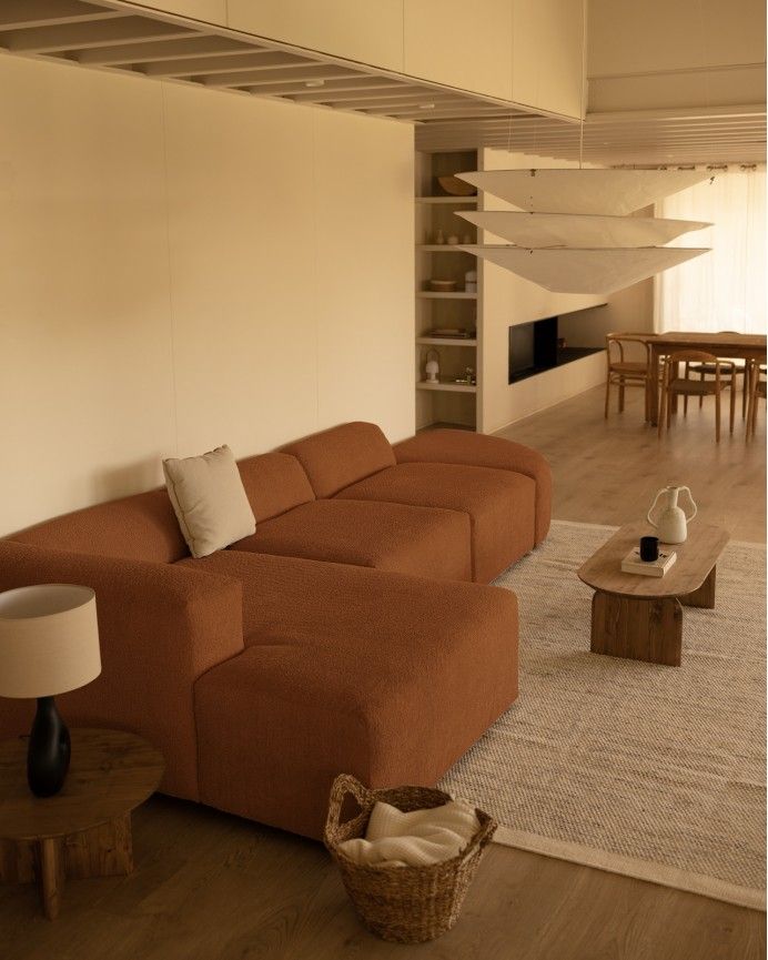 Bruce - Sofá de 4 módulos curvo con chaise longue izquierdo de bouclé color cobre 410x172cm