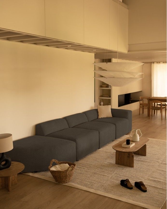 Bruce - Sofá de 4 módulos con curva de bouclé color gris oscuro 410x110cm