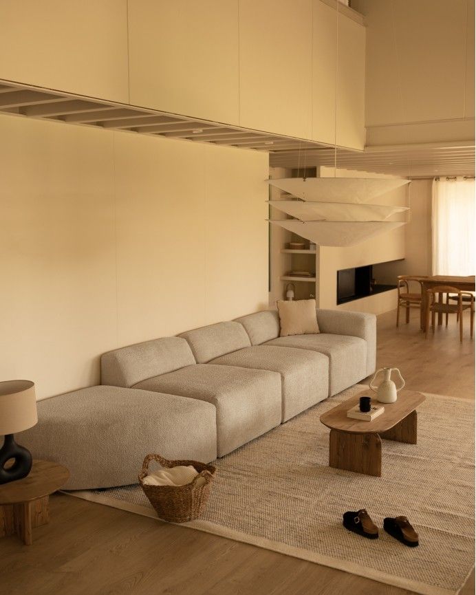 Bruce - Sofá de 4 módulos con curva de bouclé color gris claro 410x110cm