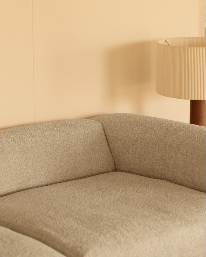 Bruce - Sofá de 4 módulos con curva de bouclé color gris claro 410x110cm