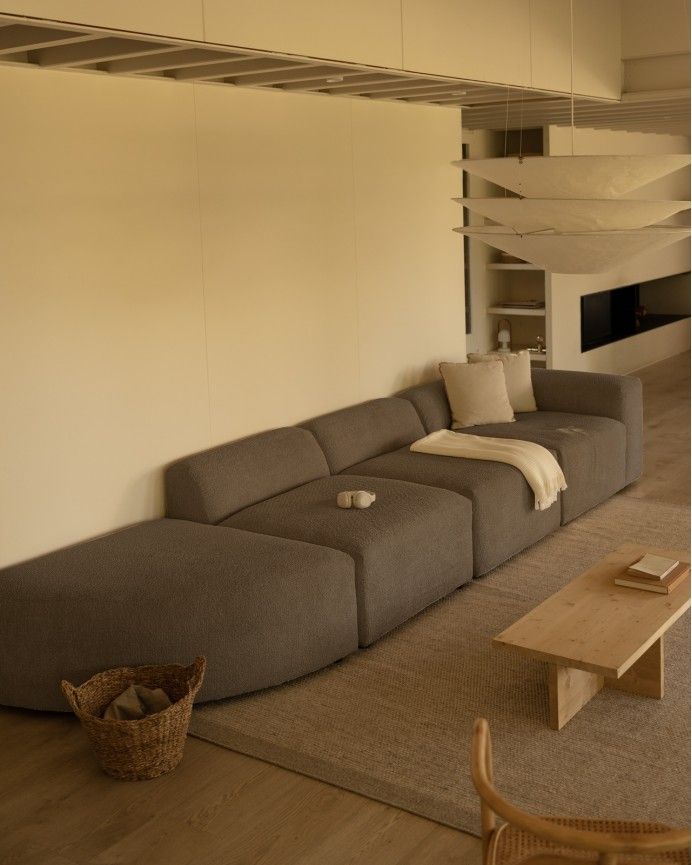 Bruce - Sofá de 4 módulos con curva de bouclé color marrón 410x110cm