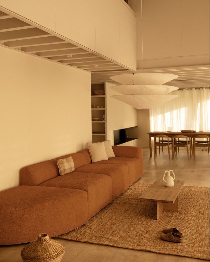 Bruce - Sofá de 4 módulos con curva de bouclé color cobre 410x110cm
